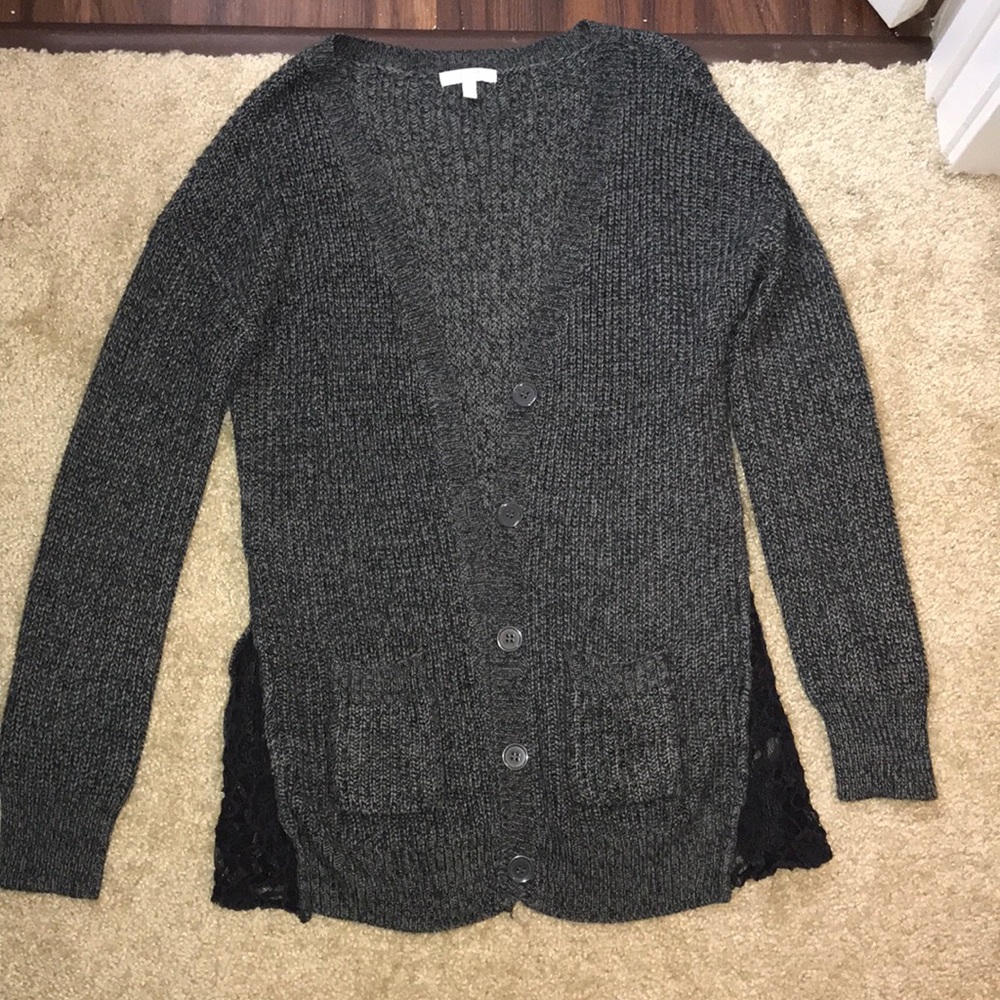 Delia’s gray cardigan
